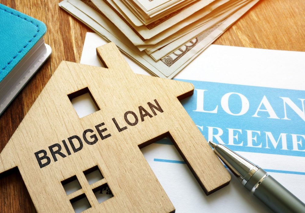 Bridge loan and mortgage agreement with pen.